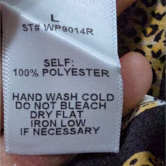 Stylish black wide-leg pants. Features a bold leopard print. - Picture 14 of 15